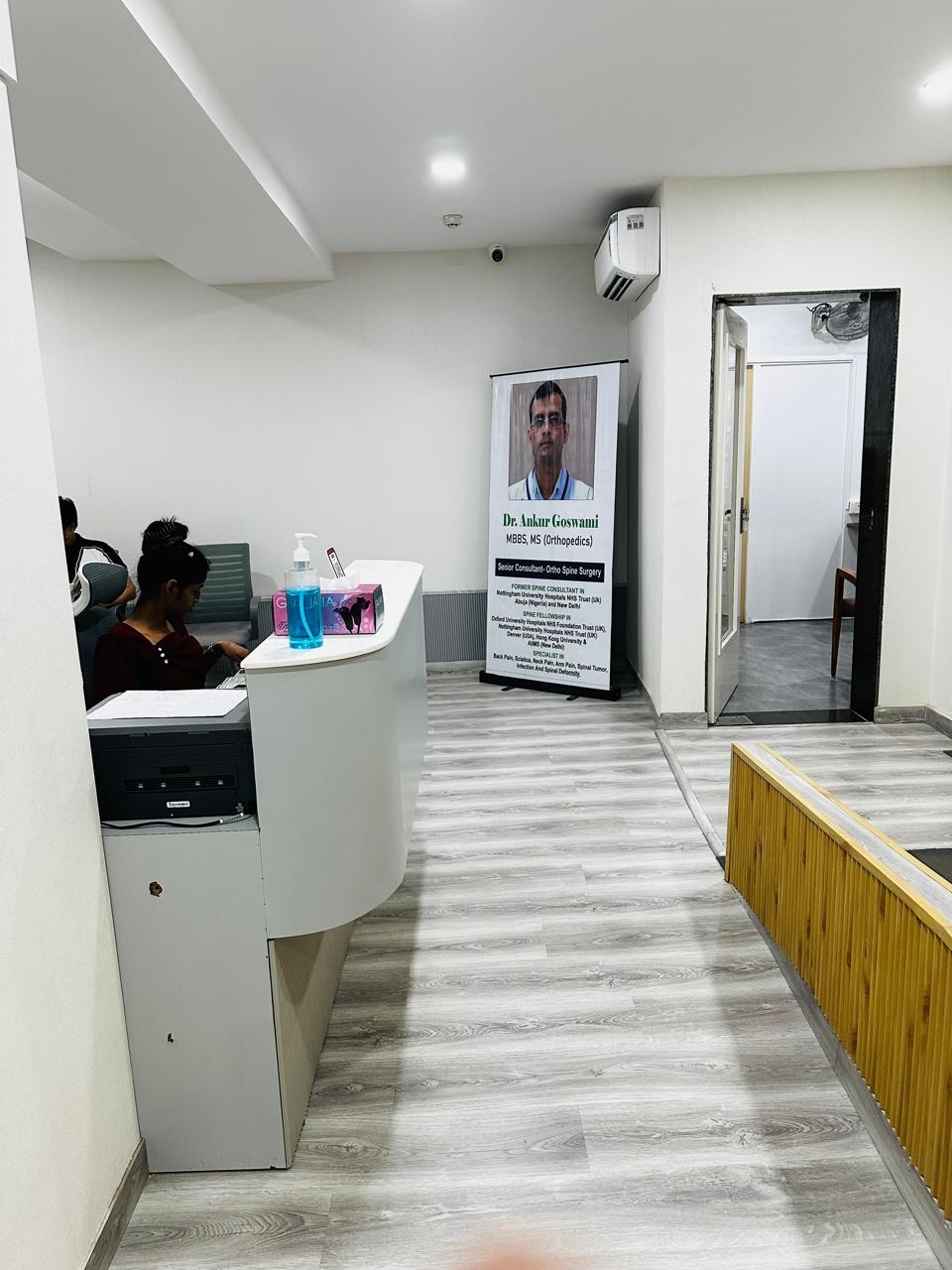 Reception waiting area with Dr. Ankur Goswami consultant banner
