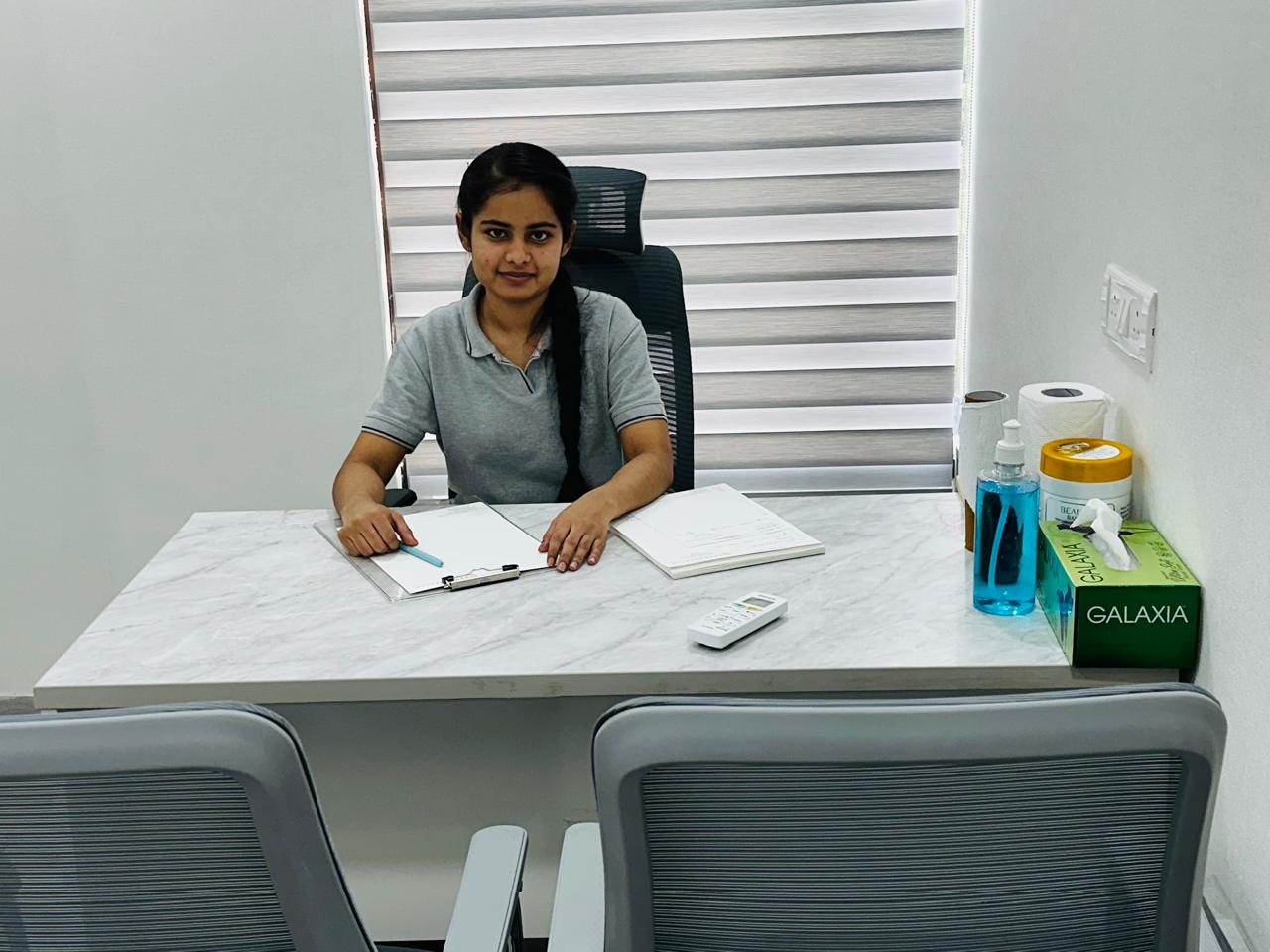 Doctor consultation room with desk and seating